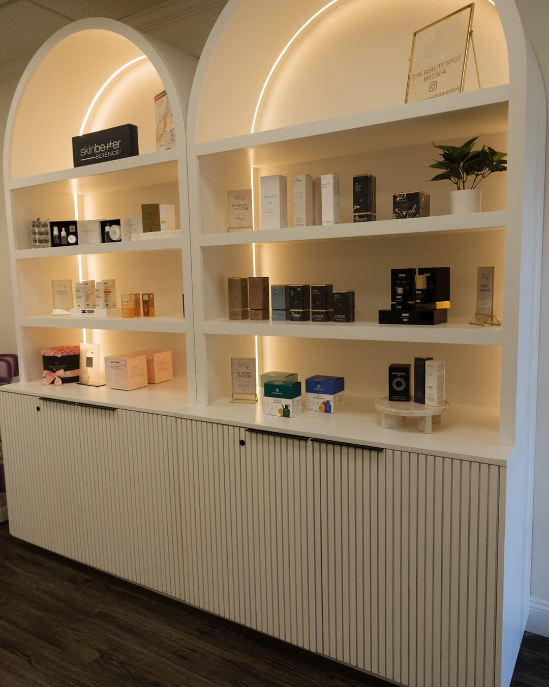 Retail display shelving inside The Beauty Spot Medspa studio in North Haven, CT
